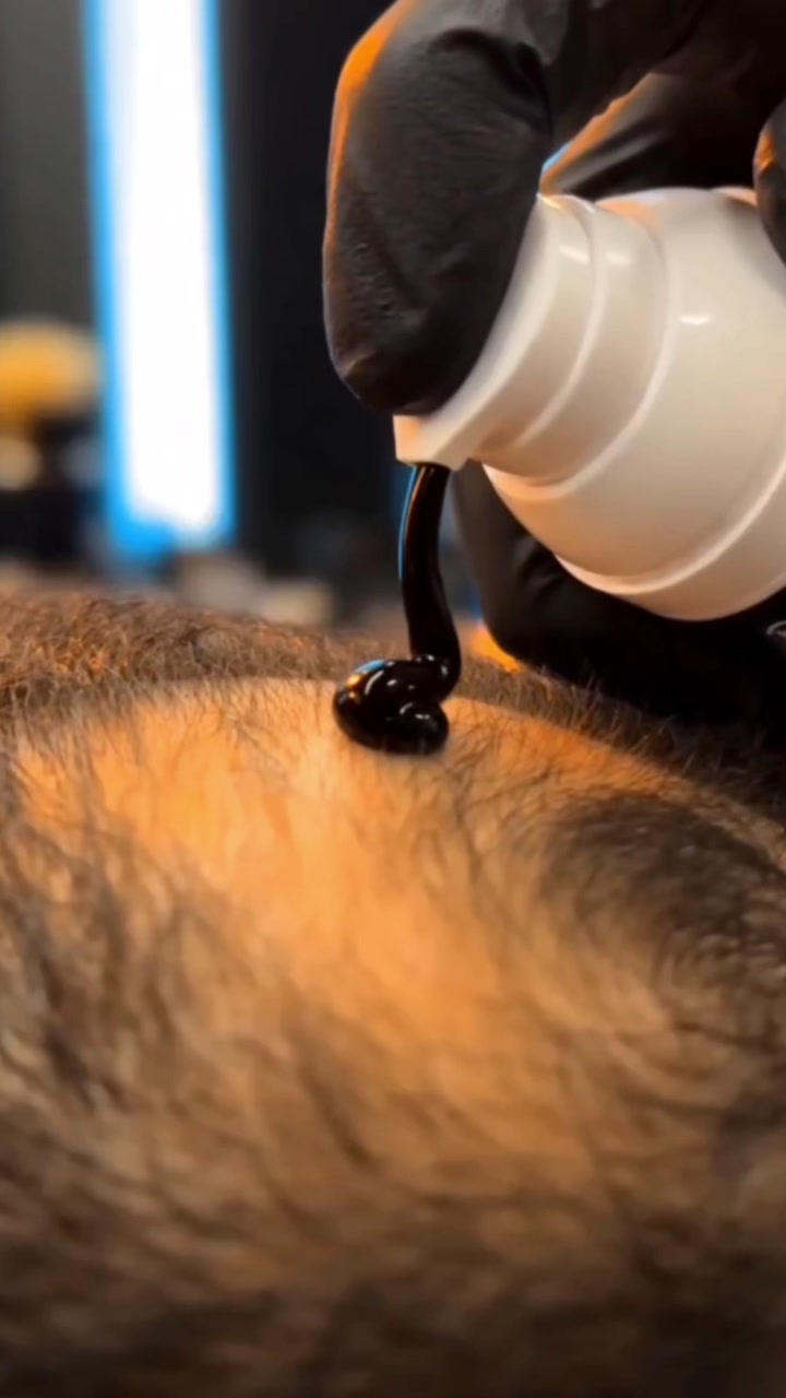 Video 1 of 6: demonstration of the concealer being applied to thinning areas.